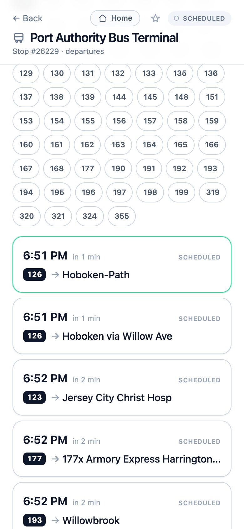 NJ Transit bus departure board for Port Authority Bus Terminal, listing upcoming buses by route number, destination and time
