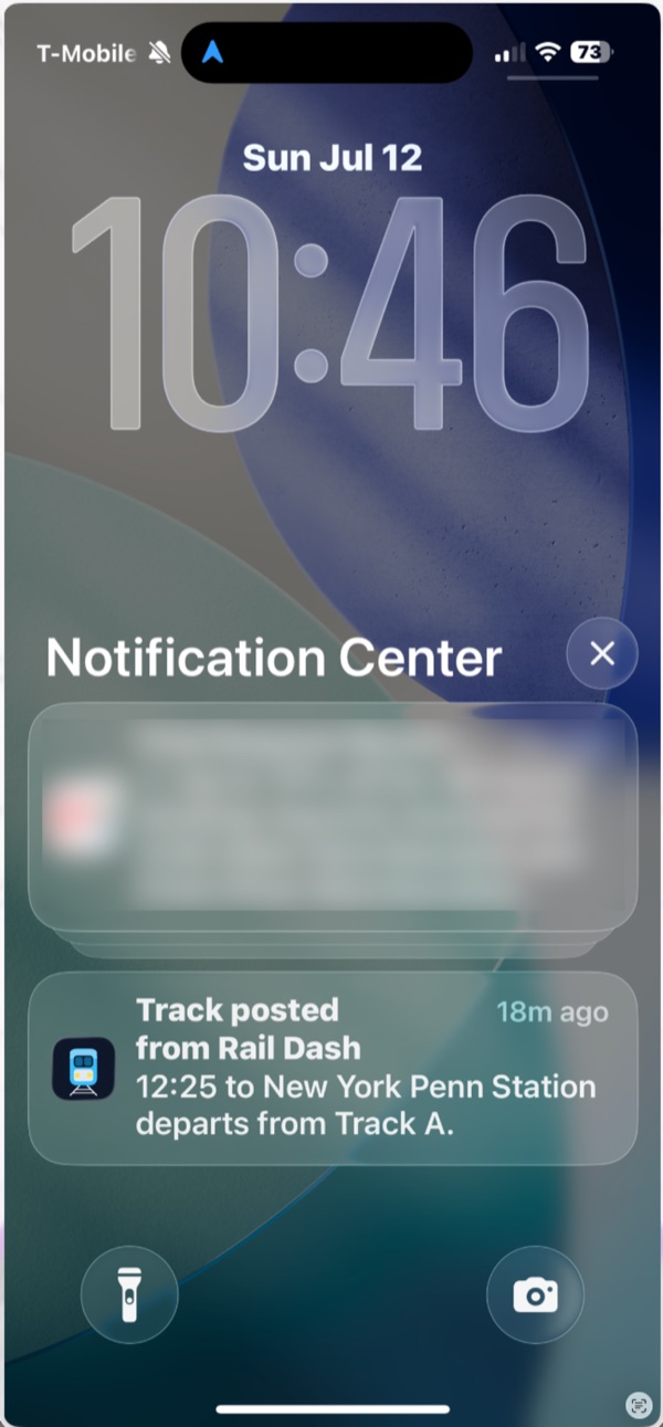 Lock-screen push notification from RailDash reading: Track posted — 12:25 to New York Penn Station departs from Track A